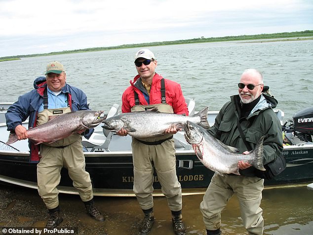 In July 2008, Justice Samuel Alito (center) traveled to Alaska thanks to billionaire conservative donor Paul Singer (right) and stayed at a luxury fishing lodge that charged more than $1000 a night. They are seen here with another guest in a photo obtained by ProPublica